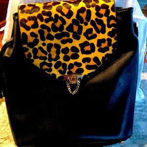 Back pack style handbag leopard faux hair
